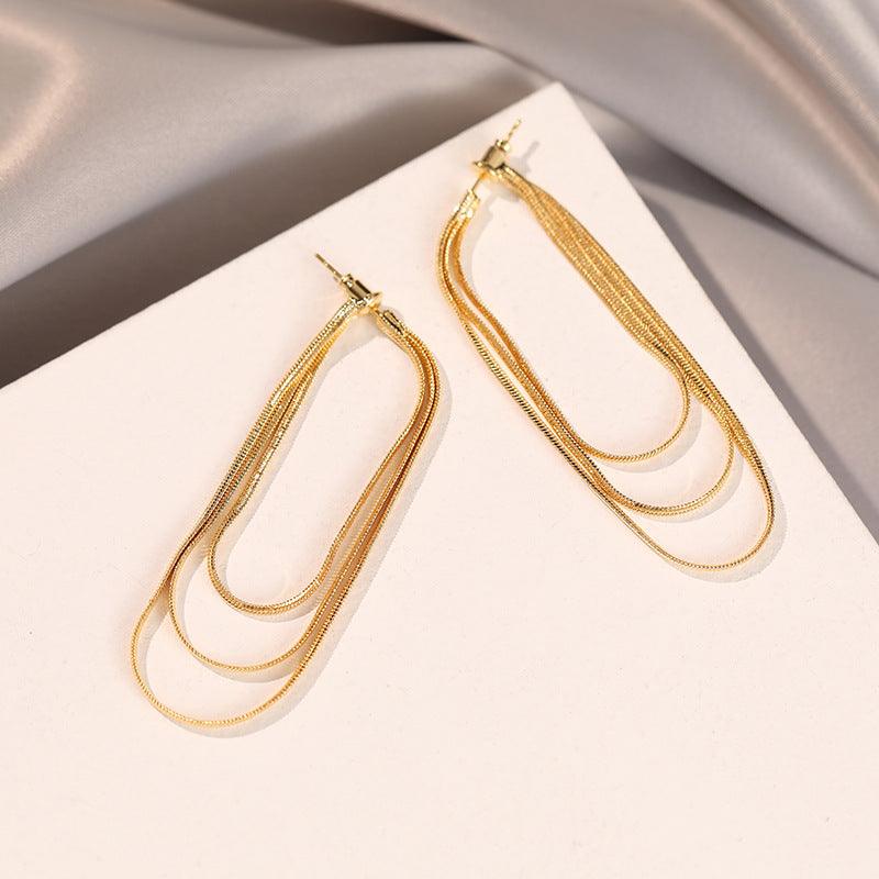 Snake Bone Chain Tassel Earrings - zuzumia