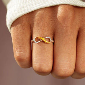 Feather From An Angel Infinity Ring